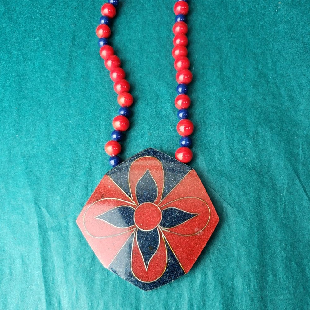 2/30$ vintage Karla Jordan glass sand art blue and red floral pendant